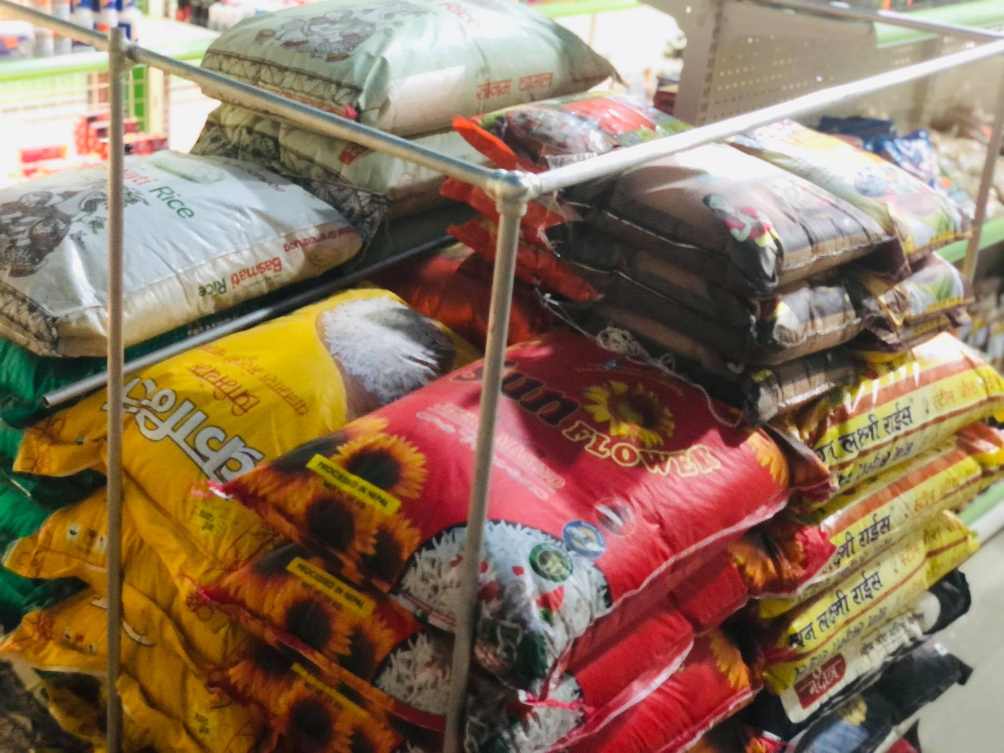 Stack of large rice bags and other grains